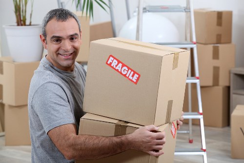 Man and van loading recyclable household items in Ealing