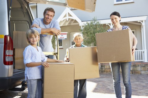 Professional packing materials and careful room-by-room preparation
