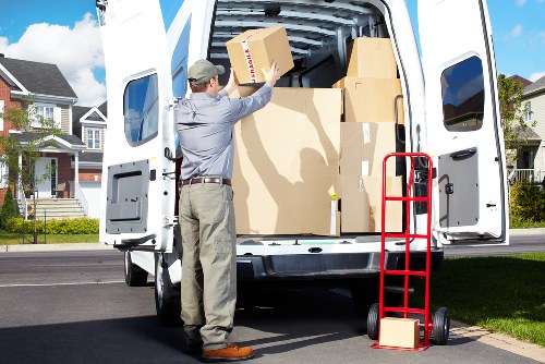 Removal crew loading office equipment for a move in West London