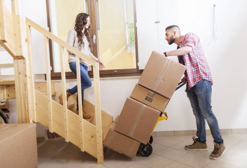 A moving team handling access and loading for an Ealing business