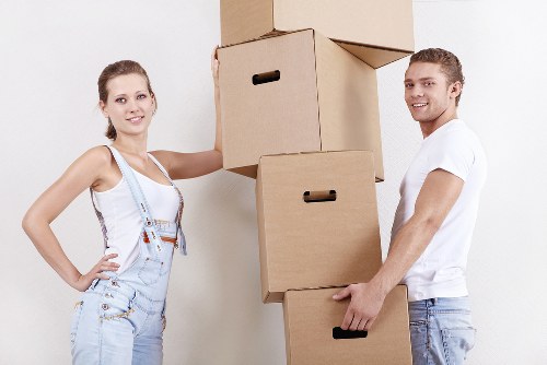 Packed boxes and wrapped furniture ready for a house move in Ealing
