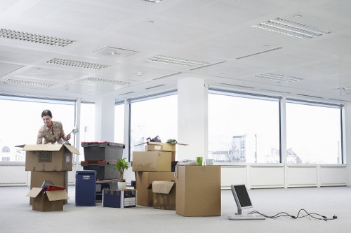 Commercial movers relocating office equipment in Ealing