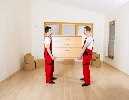 Careful packing of office furniture and equipment for an Ealing move